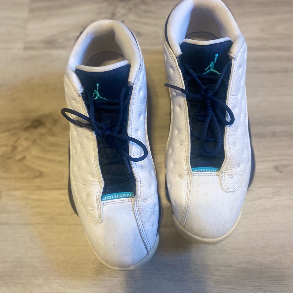 Jordan’s 13 Retro Low Hornets White/Midnight Blue Sneakers